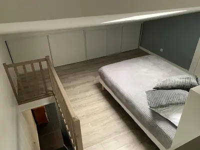 Un ou plusieurs lits dans un hébergement de l'établissement Loft Porte de Gentilly