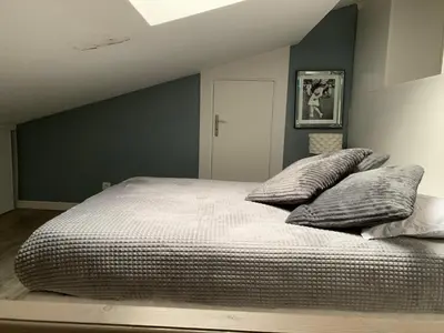 Un ou plusieurs lits dans un hébergement de l'établissement Loft Porte de Gentilly