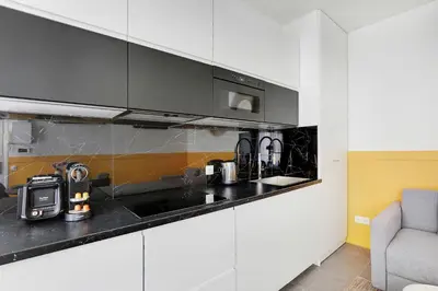 Cuisine ou kitchenette dans l'établissement Charming apart -1BR-5P - République