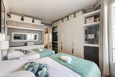 Un ou plusieurs lits dans un hébergement de l'établissement GuestReady - Superbe apt familiale dans le Marais
