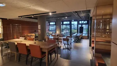 Coin salon dans l'établissement Ibis Budget Paris porte de la Chapelle - Aréna