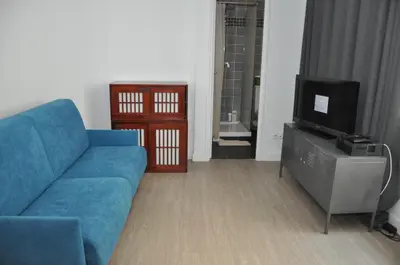 Télévision ou salle de divertissement dans l'établissement Faubourg Saint Martin