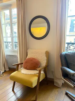 Coin salon dans l'établissement L'appartement Jour