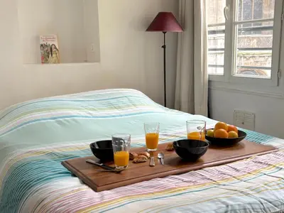 Un ou plusieurs lits dans un hébergement de l'établissement L'appartement Jour