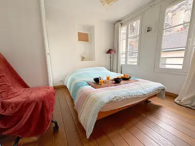 Un ou plusieurs lits dans un hébergement de l'établissement L'appartement Jour