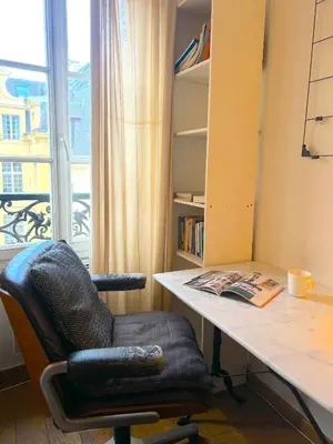Coin salon dans l'établissement L'appartement Jour