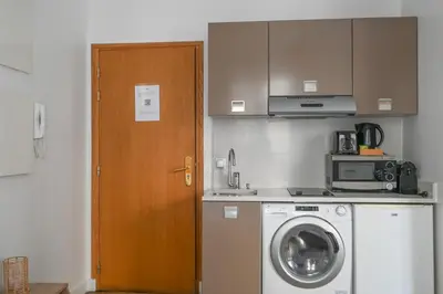 Cuisine ou kitchenette dans l'établissement Opéra 2