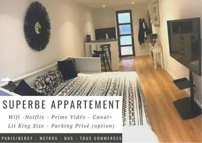 Un ou plusieurs lits dans un hébergement de l'établissement Superbe appartement Paris/Bercy (12e) wifi&Netflix