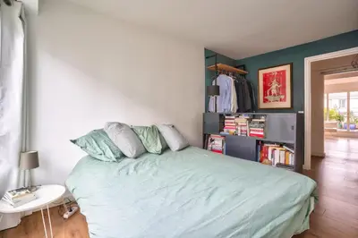 Un ou plusieurs lits dans un hébergement de l'établissement GuestReady - Apt confortable avec terrasse au 18e
