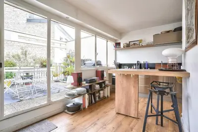 Cuisine ou kitchenette dans l'établissement GuestReady - Apt confortable avec terrasse au 18e
