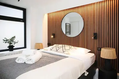 Un ou plusieurs lits dans un hébergement de l'établissement Appartement de caractère aux portes du Marais - 4P - FLAT-GUEST