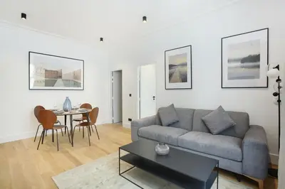 Coin salon dans l'établissement Apartment Palais Royal by Studio prestige