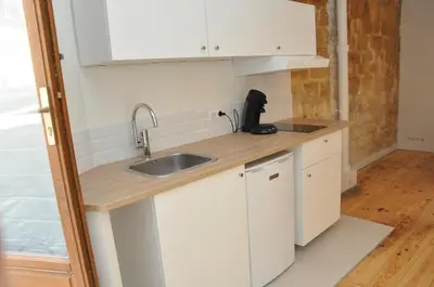 Cuisine ou kitchenette dans l'établissement Montmartre