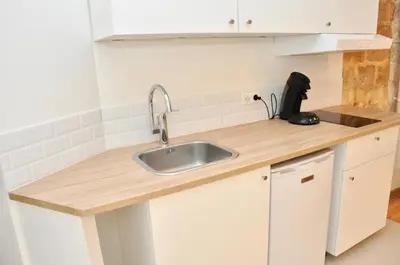 Cuisine ou kitchenette dans l'établissement Montmartre