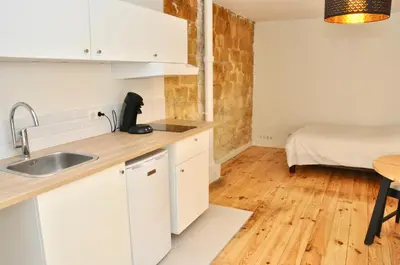 Cuisine ou kitchenette dans l'établissement Montmartre