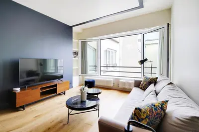 Télévision ou salle de divertissement dans l'établissement Amazing apartments - Arc de Triomphe-Champs Elysée