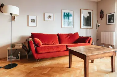 Coin salon dans l'établissement GuestReady - Apt de charme près du Buttes Chaumont