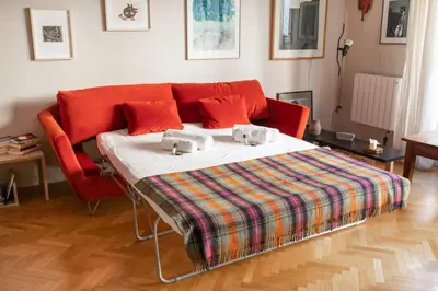 Coin salon dans l'établissement GuestReady - Apt de charme près du Buttes Chaumont