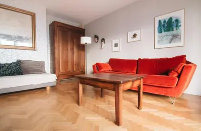 Coin salon dans l'établissement GuestReady - Apt de charme près du Buttes Chaumont