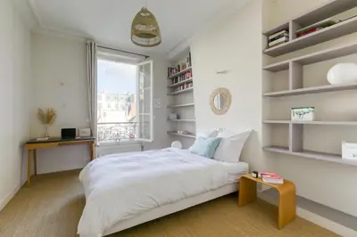Un ou plusieurs lits dans un hébergement de l'établissement Superbe appart de 129m2, 3 ch-Neuilly 2 min Paris