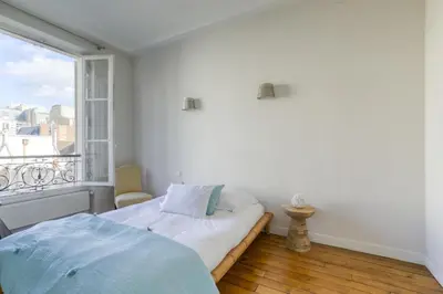 Un ou plusieurs lits dans un hébergement de l'établissement Superbe appart de 129m2, 3 ch-Neuilly 2 min Paris