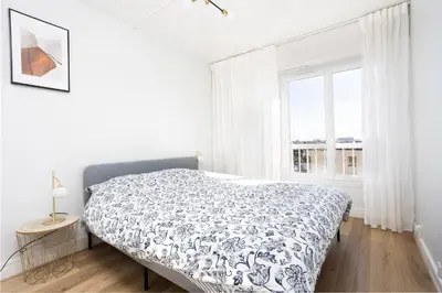 Un ou plusieurs lits dans un hébergement de l'établissement Renovated apartment metro, parking included, near Porte Versaille