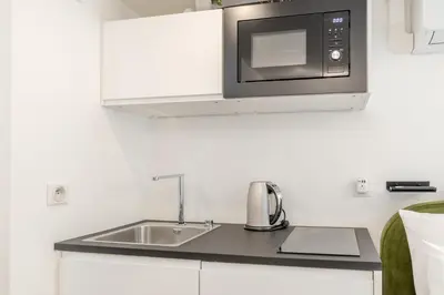 Cuisine ou kitchenette dans l'établissement Studio élégant - Smart TV Nespresso WIFI