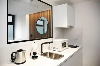 Cuisine ou kitchenette dans l'établissement Logement Idéal en Famille - Porte du Marais - 6P - FLAT-GUEST
