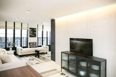Télévision ou salle de divertissement dans l'établissement Logement Idéal en Famille - Porte du Marais - 6P - FLAT-GUEST