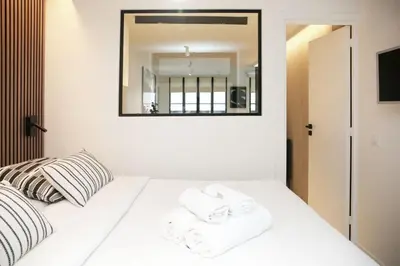 Un ou plusieurs lits dans un hébergement de l'établissement Logement Idéal en Famille - Porte du Marais - 6P - FLAT-GUEST