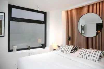 Un ou plusieurs lits dans un hébergement de l'établissement Logement Idéal en Famille - Porte du Marais - 6P - FLAT-GUEST
