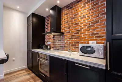 Cuisine ou kitchenette dans l'établissement MBM - Paradis