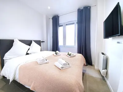 Un ou plusieurs lits dans un hébergement de l'établissement Home in Paris - Paris East