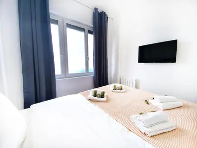 Un ou plusieurs lits dans un hébergement de l'établissement Home in Paris - Paris East