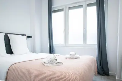 Un ou plusieurs lits dans un hébergement de l'établissement Home in Paris - Paris East