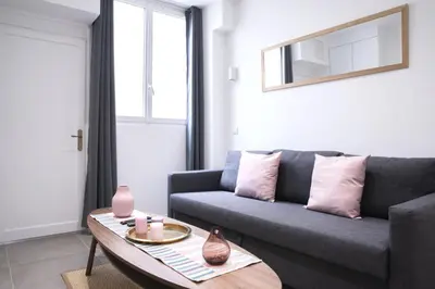 Coin salon dans l'établissement Home in Paris - Paris East