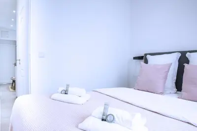 Un ou plusieurs lits dans un hébergement de l'établissement Home in Paris - Paris East