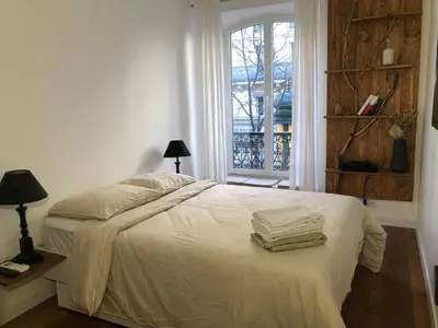 Un ou plusieurs lits dans un hébergement de l'établissement PARIS SWEET DREAM