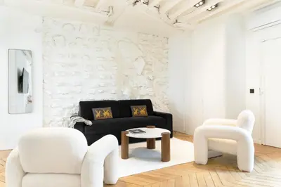 Coin salon dans l'établissement Pick A Flat's Apartment in Le Marais - Rue des Gravilliers
