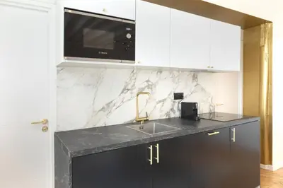 Cuisine ou kitchenette dans l'établissement Pick A Flat's Apartment in Le Marais - Rue des Gravilliers