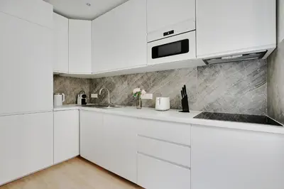 Cuisine ou kitchenette dans l'établissement Charming apartment - 2BR-6P -In the heart of Paris