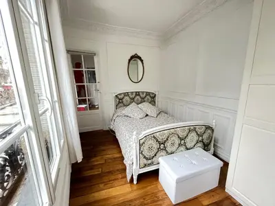 Un ou plusieurs lits dans un hébergement de l'établissement Bohemian Apartment in Montmartre - Paris