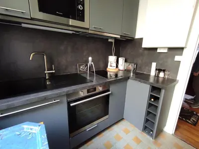 Cuisine ou kitchenette dans l'établissement Neuilly-Sur-Seine f2 en rez de chaussée
