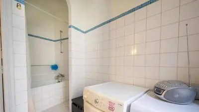 Un ou plusieurs lits dans un hébergement de l'établissement Neuilly-Sur-Seine f2 en rez de chaussée