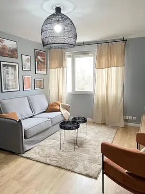 Coin salon dans l'établissement Cosy appart proche PARIS
