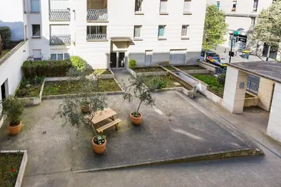 Jardin de l'établissement Cosy appart proche PARIS