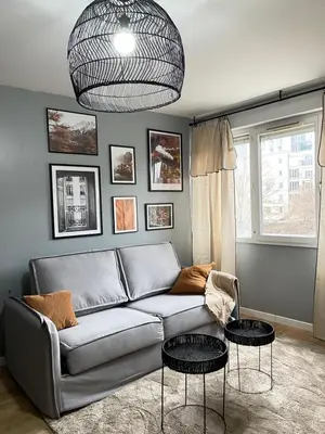 Coin salon dans l'établissement Cosy appart proche PARIS