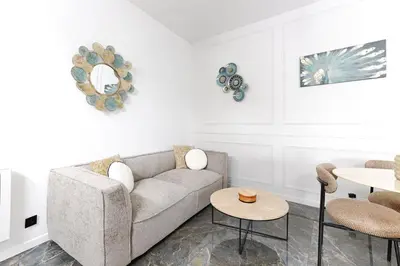 Coin salon dans l'établissement Amazing Luxury Triplex 3BR - 6P - Arc de Triomphe