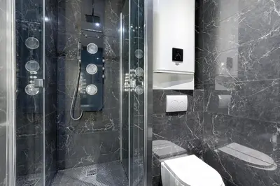 Salle de bains dans l'établissement Amazing Luxury Triplex 3BR - 6P - Arc de Triomphe