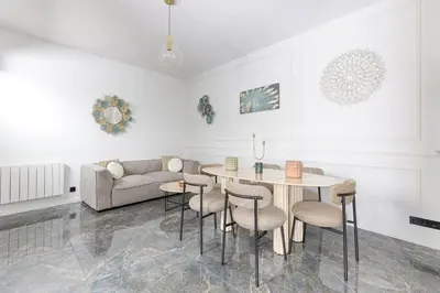 Coin salon dans l'établissement Amazing Luxury Triplex 3BR - 6P - Arc de Triomphe